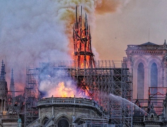 Pluto and the Notre Dame Fire